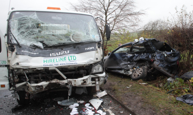 The Isuzu lorry and Mr Bissetts car immediately after the fatal accident.
