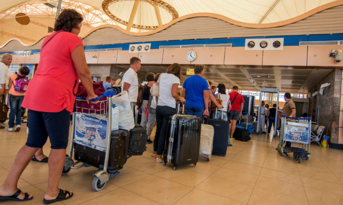 Passengers hoping to find flights home from Sharm el-Sheikh Airport.