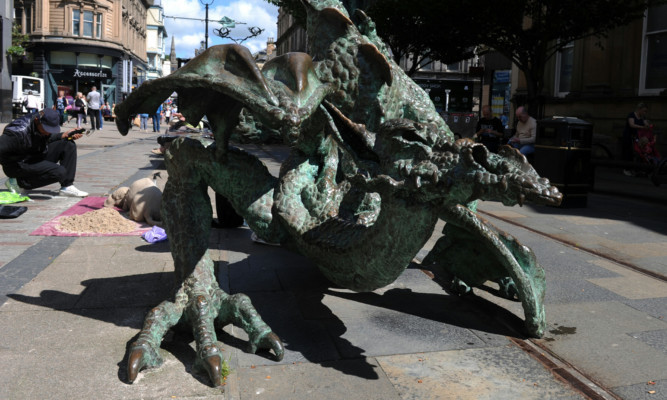 Dundee's mythical past is marked with a dragon sculpture in the High Street.