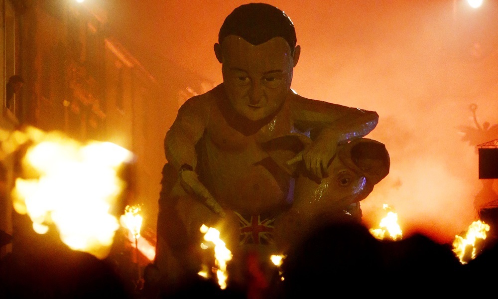 An effigy of Prime Minister David Cameron is paraded through the town of Lewes in East Sussex where an annual bonfire night procession is held by the Lewes Bonfire Societies. PRESS ASSOCIATION Photo. Picture date: Thursday November 5, 2015. Photo credit should read: Gareth Fuller/PA Wire