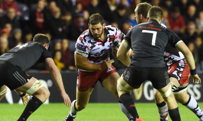 Ross Ford carries the ball up in his return to action for Edinburgh.