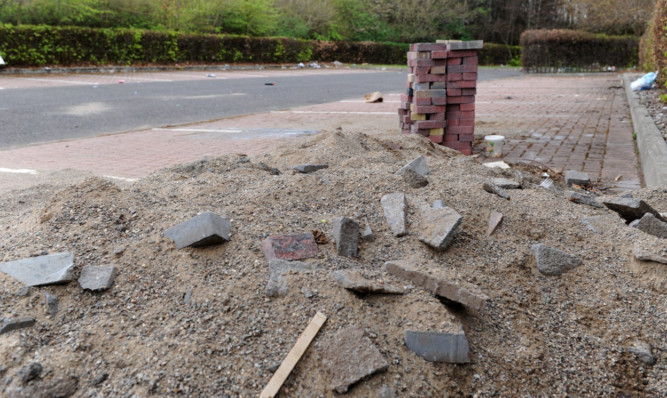 Building refuse left behind at the former General Accident site.