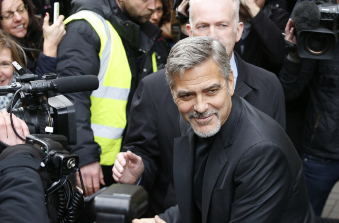 Hollywood superstar George Clooney has been given a warm welcome as he arrived in Edinburgh - to visit a sandwich shop. A large crowd gathered in Rose Street and cheered as the A-lister stepped out of his chauffeur-driven car. Clooney was visiting the Social Bite cafe to meet members of staff who were once homeless but now have jobs in the chain of shops which donates all its profits to charity.