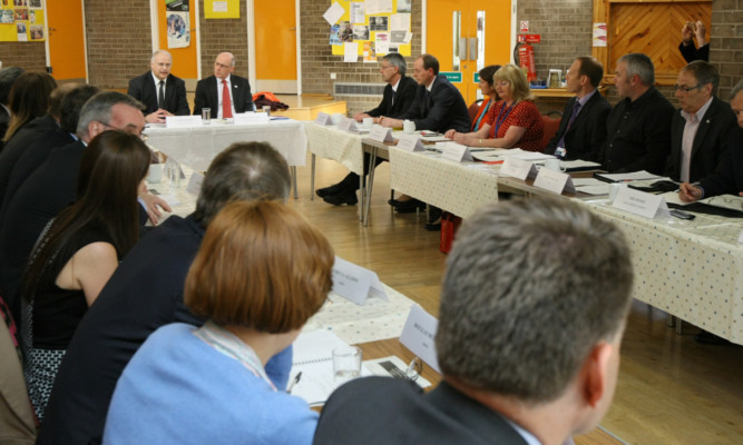 The Scottish Governments taskforce meeting in Glenrothes earlier this year following the closure of Tullis Russell paper mill.