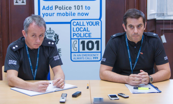 Community Inspector Graeme Neill and Superintendant Derek McEwan speaking to the media on Thursday.