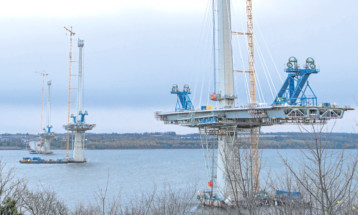 Top: an Alimak lift on one of the towers that now rise high above the Forth.