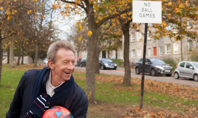 Denis Law in his home town of Aberdeen.