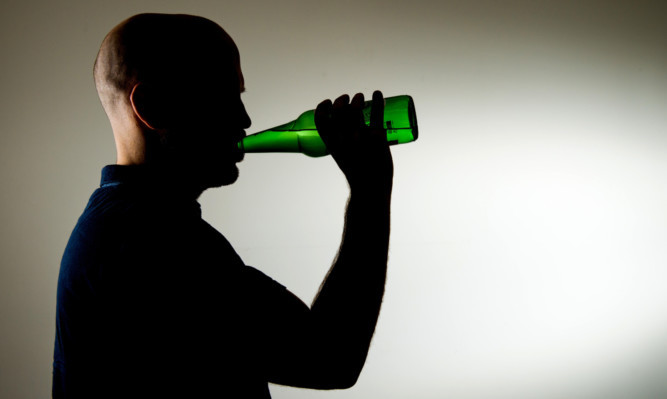 PICTURE POSED BY MODEL 

Stock photo shows a man drinking a bottle of beer. PRESS ASSOCIATION Photo. Picture date: Monday March 9, 2015. Photo credit should read: Dominic Lipinski/PA Wire
