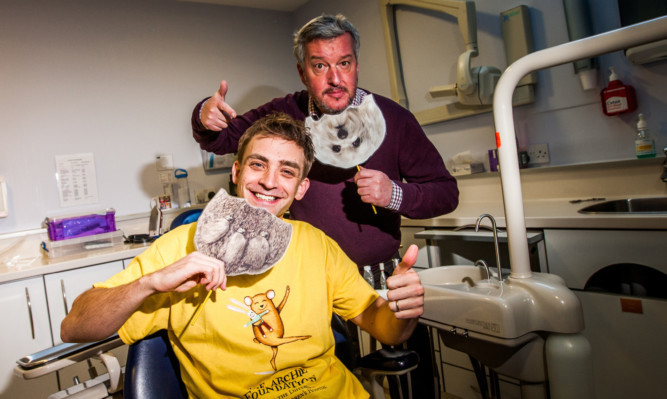 Steve MacDougall, Courier, Blairgowrie Dental Practice, High Street, Blairgowrie. Launch of Beards for Bairns 2016 for The ARCHIE. Pictured, left is dentist Neil Rutherford and right is local DJ Gary Robinson (correct).