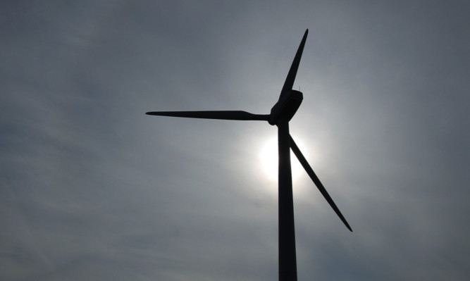 Kris Miller, Courier, 04/03/13. Picture today at Methil shows the wind turbine at Methil docks. Plans to build a turbine, five times the size of this one have been submitted. **Sky left at top of pic as requested.