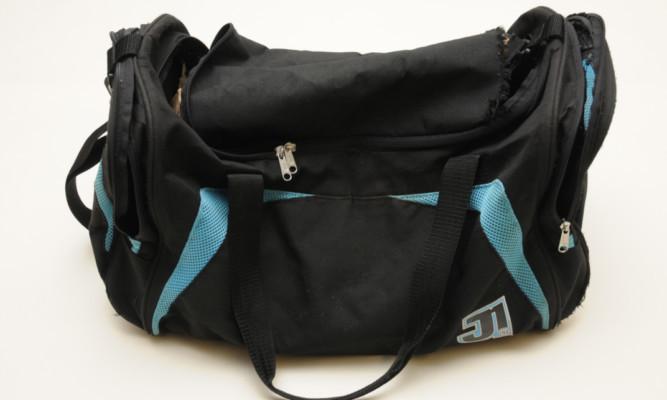 Police are asking for information on a distinctive black holdall that was used during the robbery.