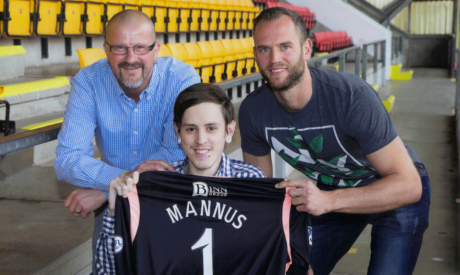 Kyle, dad Andrew and St Johnstone keeper Alan Mannus.