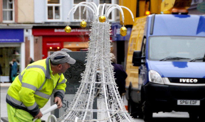 Finishing touches are added to the Christmas lights in Perth.