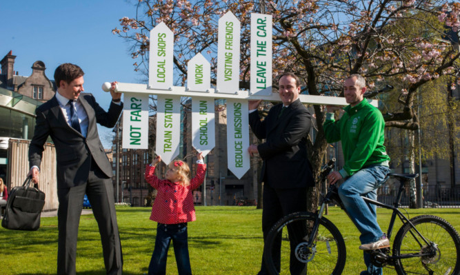 Environment Minister Paul Wheelhouse (second from right) launches the campaign with the help of (from left) Stuart Martin, Mia McDonald and cyclist Mark McIntosh.