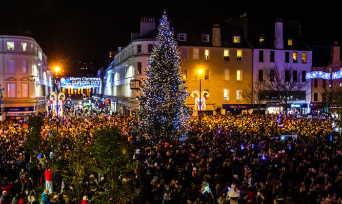 A large crowd watched Santa switch on Dundees Christmas lights.