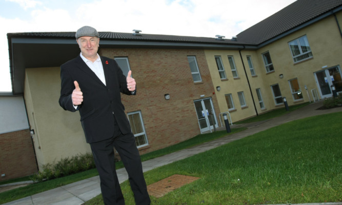 Councillor Neil Crooks beside the Ostlers House care home in Kirkcaldy.