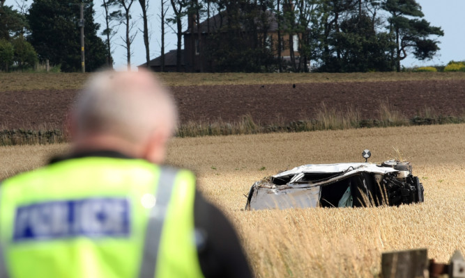 The aftermath of a fatal crash near Arbroath in August.