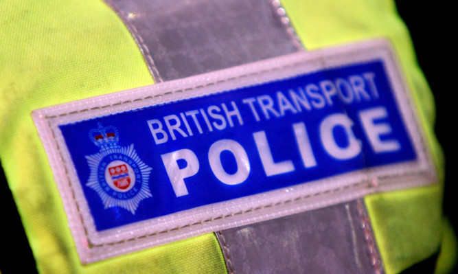 Kris Miller, Courier, 15/02/14. InvFootballViolence. Pics show British Transport Police at Dundee Railway Station keeping an eye on football fans after the Dundee United V Kilmarnock game.