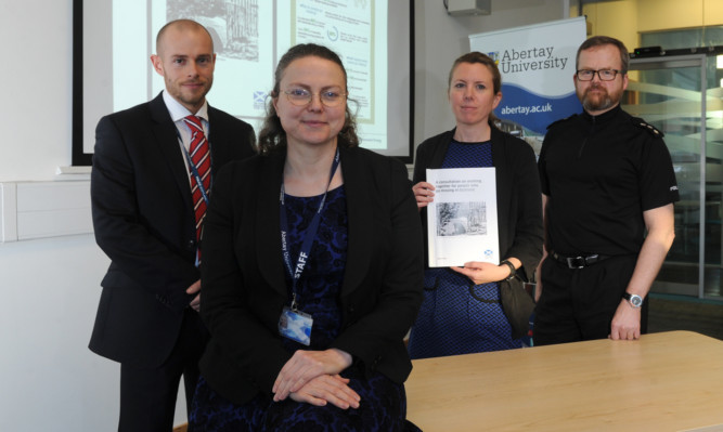 Detective Constable Richard Grieve, operations lead for missing persons in Tayside, Dr Penny Woolnough, lecturer in psychology at Abertay University, Katherine Byrne, Scottish Government policy officer, and Chief Inspector Mike Whitford, tactical lead for missing persons in Tayside.
