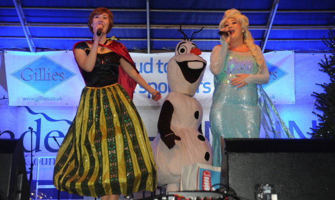 Anna, Olaf and Elsa from Frozen.