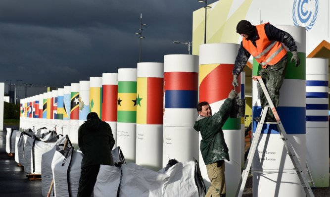 Workers make final preparations for the COP21, Paris Climate Conference site in Le Bourget, France.  The 21st United Nations Conference on climate change will run from from November 30 to December 11.