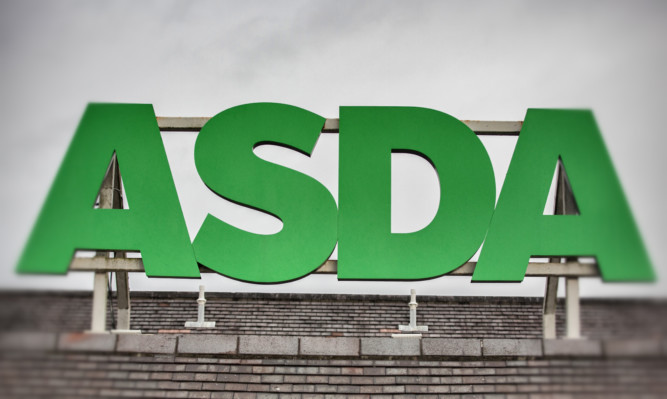 BRISTOL, ENGLAND - NOVEMBER 18:  (EDITORS NOTE: This image was created using digital filters) The Asda sign is displayed outside a branch of the supermarket on November 18, 2015 in Bristol, England. As the crucial Christmas retail period approaches, all the major supermarkets are becoming increasingly competitive to retain and increase their share of the market.  (Photo by Matt Cardy/Getty Images)