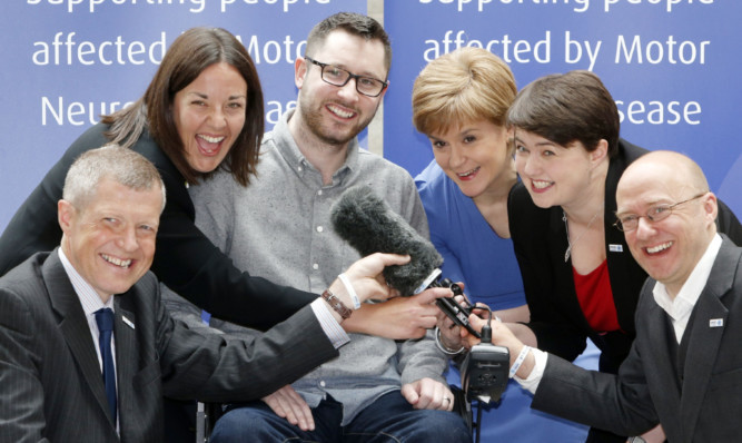 Scotland's political leaders, pictured with Kirkcaldy-born MND campaigner Gordon Aikman, will face off at a Dundee University debate