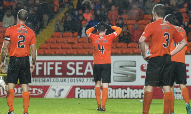 Dundee United players hang their heads after Hamilton level.