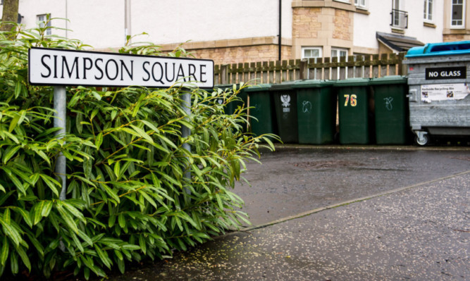 The bin area at Simpson Square which residents claim has been left a mess.