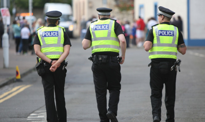 Kris Miller, Courier, 26/06/14. Queen's Baton Relay for Commonwealth Games shows general view of police officers from Police Scotland, Fife Branch on the streets of Pittenweem in the East Neuk. For files.
