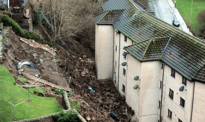 The residents were evacuated after the landslide hit in December 2013.