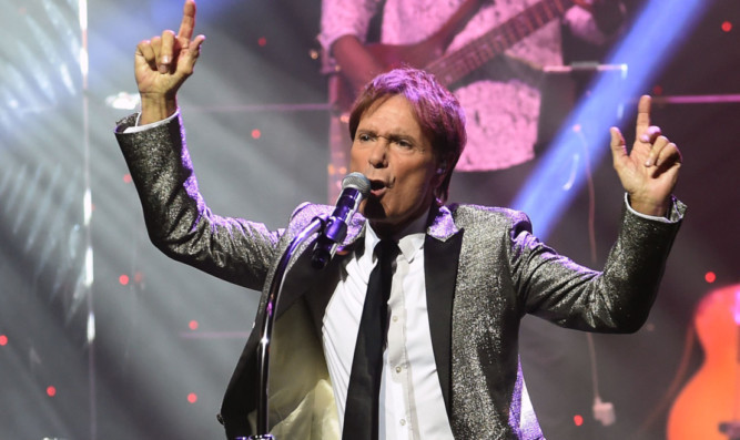 Cliff Richard performs on stage during his 75th Birthday Tour at Symphony Hall, Birmingham.