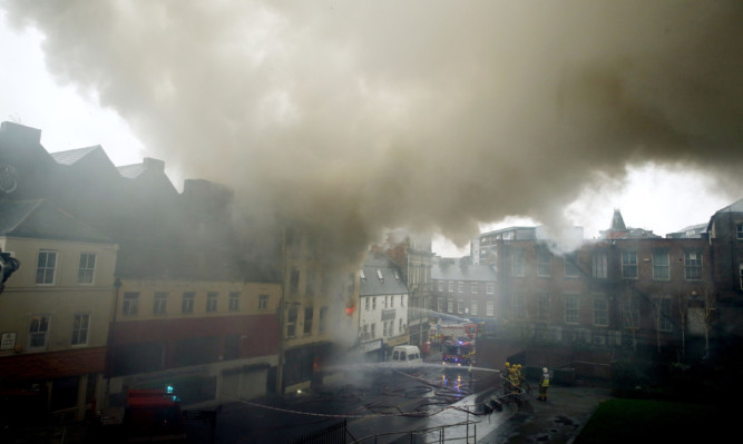 The fire broke out in Cross Street in the city centre.