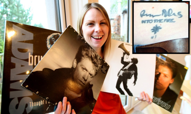 Clair Barnett with some of her Bryan Adams and (inset top right) the tattoo of his signature.