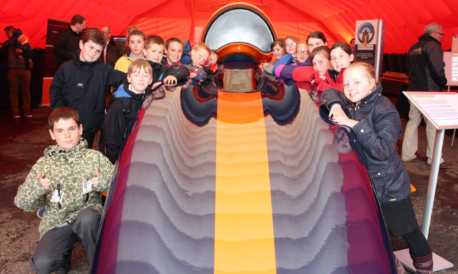 Pupils from St Ninians Primary in Perth with the supersonic car.