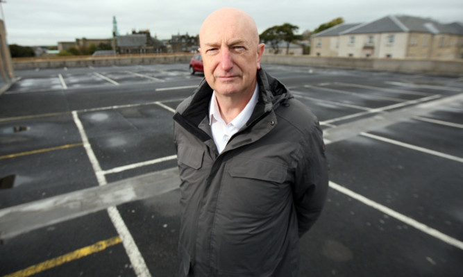 Councillor Neil Crooks is urging the local authority to take action to see the Postings car park full again, which he feels could help revitalise the High Street.