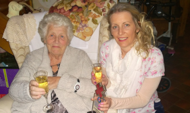 Emma Scott and mum Doreen with her award for being First Aid Hero of the Year.