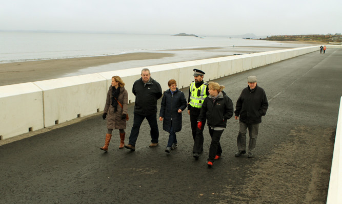 From left: Kirkcaldy For All members Susie Hall, Bill Harvey, Christine May, Sgt Jimmy Adamson, Cllr Susan Leslie and Chair of Kirkcaldy West Community Council David Henderson on the Esplande.