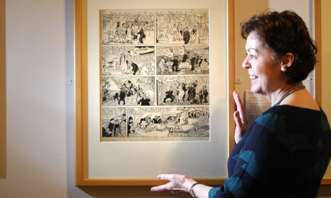 Susan Keracher with Broons artwork by Dudley D. Watkins.