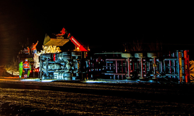 The lorry shed its load near Pitlochry, completely blocking the northbound carriageway.