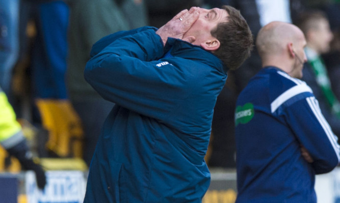 Tommy Wright reacts after another Saints chance is missed.