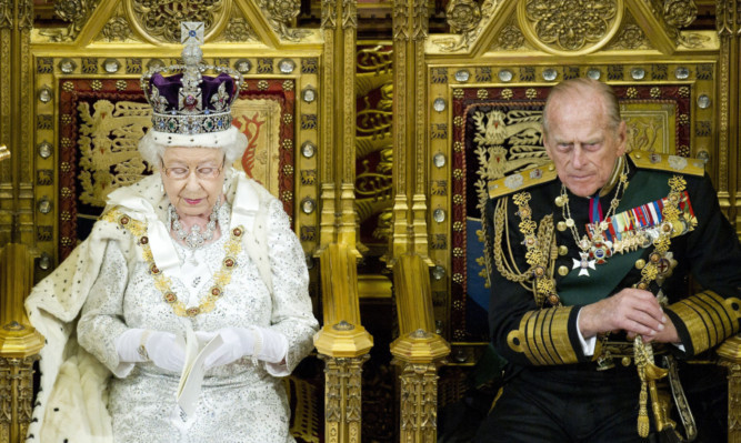 Queen Elizabeth II and the Duke of Edinburgh during the Queens Speech at the State opening of Parliament.