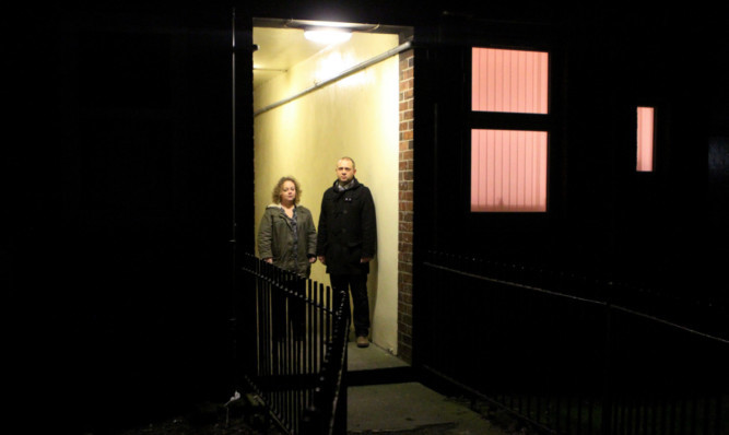 Councillor Kevin Cordell and resident Laura Hynd in one of the lit parts of Bowmans Lane, Broughty Ferry.