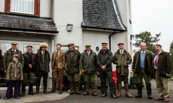 Councillor Bob Myles, chairman of Glenesk Trust (far right) at the Retreat, welcoming the shooting party which helped raise vital cash for the venue.