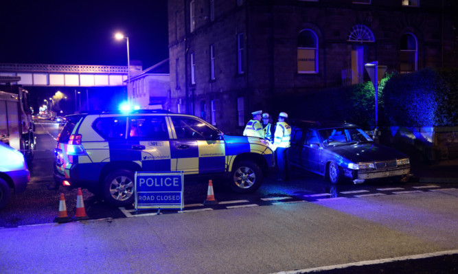 A gas main was damaged after a car crash in Perth