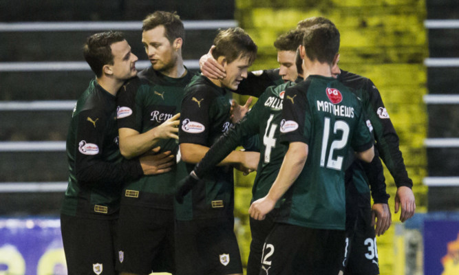 James Craigen, left, celebrates with his team-mates.