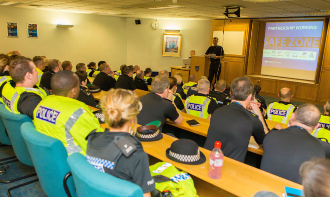 Superintendent Dougie Milton briefs 72 officers and 12 community wardens.