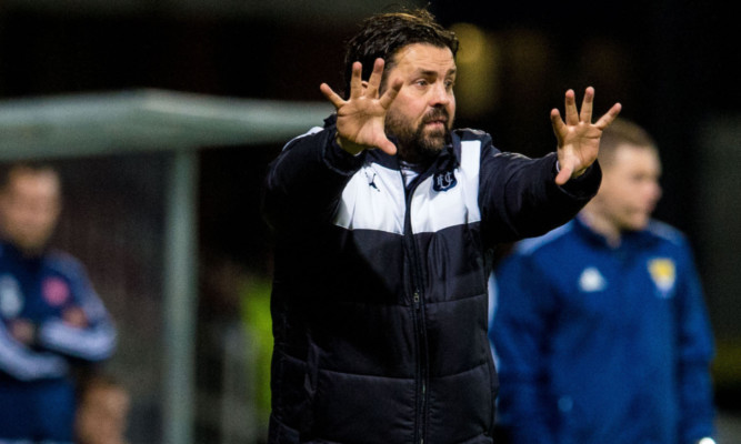 Paul Hartley on the touchline at Dens.