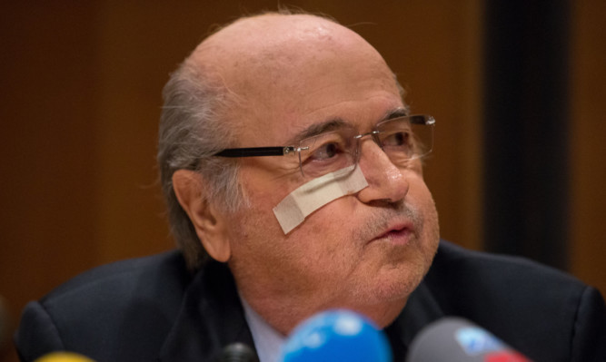 Sepp Blatter attends a press conference as reaction to his banishment for eight years by the FIFA ethics committee.