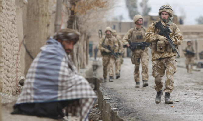 British troops have been deployed to help local forces as they fight to take control of the town of Sangin after it fell back under Taliban control.